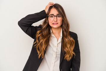 Young caucasian business woman isolated on white background being shocked, she has remembered important meeting.