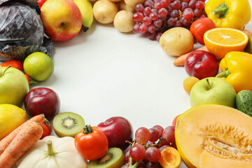 Set of different vegetables and fruits on white background