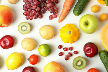 Set of different vegetables and fruits on white background