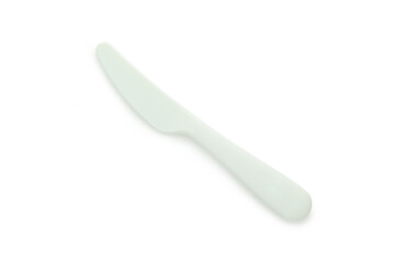 Single plastic knife isolated on white background