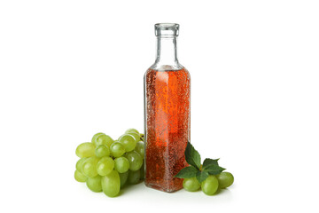 Bottle of vinegar and grape isolated on white background