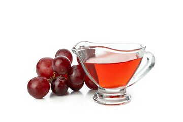 Sauce boat with vinegar and grape isolated on white background