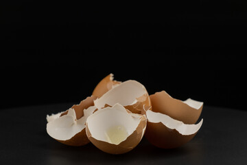 Broken of egg shell group crack  isolated on black background