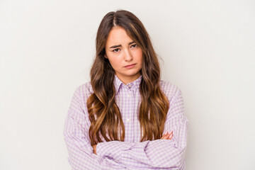 Obraz premium Young caucasian woman isolated on white background unhappy looking in camera with sarcastic expression.
