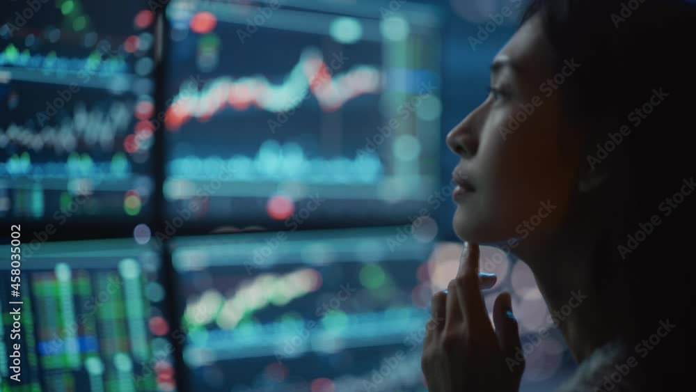 Poster close up portrait of financial analyst working on computer with multi-monitor workstation with real-