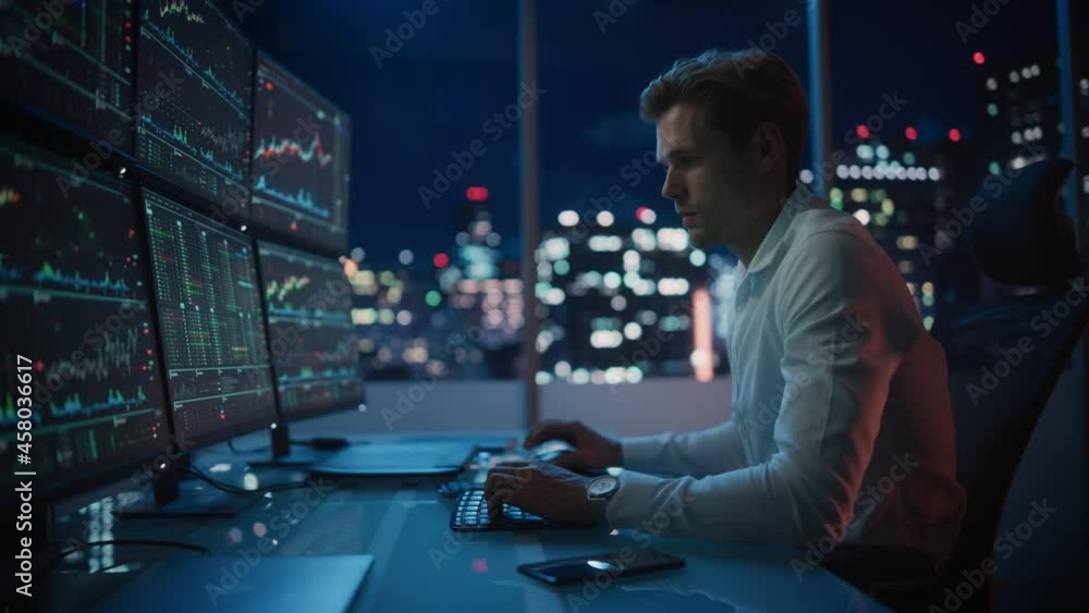 Poster financial analyst working on a computer with multi-monitor workstation with real-time stocks, commod
