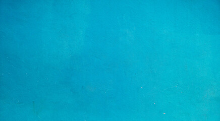 Fototapeta na wymiar Old concrete wall in blue tones