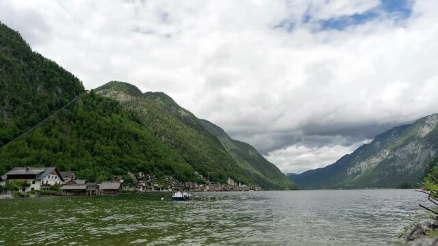 Time lapse footage of Hallstatt village on Hallstatter lake in Austrian Alps.