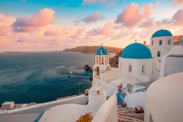Ingelijste posters Europe summer destination. Traveling concept, sunset scenic famous landscape of Santorini island, Oia, Greece. Caldera view, colorful clouds, dream cityscape. Vacation panorama, amazing outdoor scene © icemanphotos