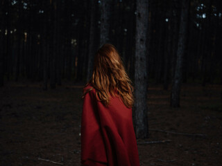 Red-haired woman red plaid forest freedom nature