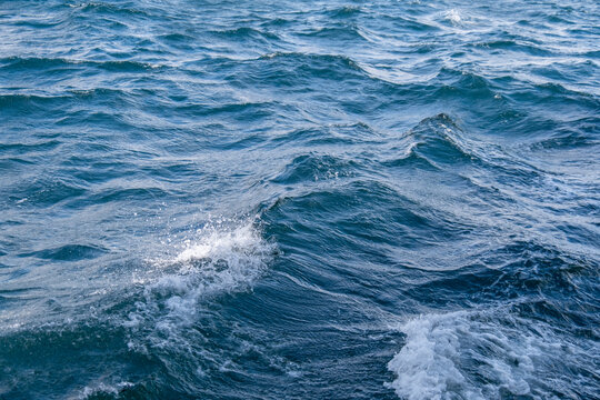 waves on the water surface. Wavy sea. © mustafaoncul
