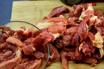 fresh raw meat on cutting board for cooking 