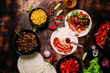 Tacos with meat and vegetables. Cooking tacos