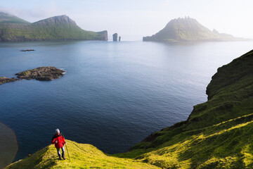 Hiking on the old postal route to Gasadalur, Faroe Islands