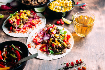 Tacos with meat and vegetables. Cooking tacos