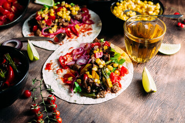Tacos with meat and vegetables. Cooking tacos