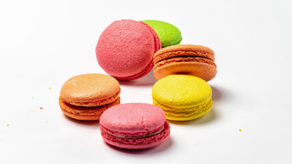 colorful macaroons on white background