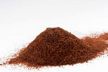 Pile of coffee powder isolated on white