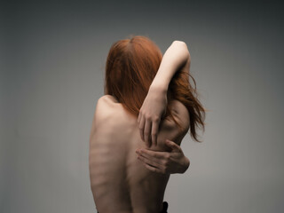 naked back women posing anorexia close-up