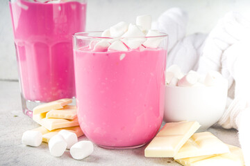 Pink beetroot latte, beets hot chocolate with marshmallow, modern sweet organic vegan drink 