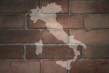 map of italy on a old brick wall
