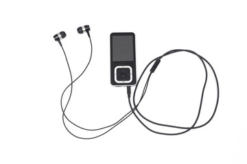 black mp3 player with headphones on white background.