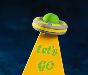 Space travel concept, UFO with quote Lets go