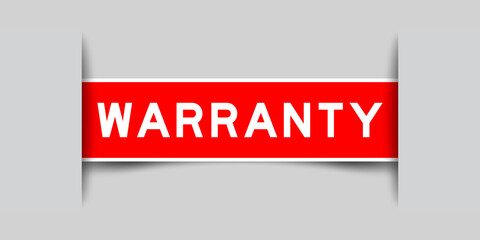 Inserted red color label sticker with word warranty on gray background