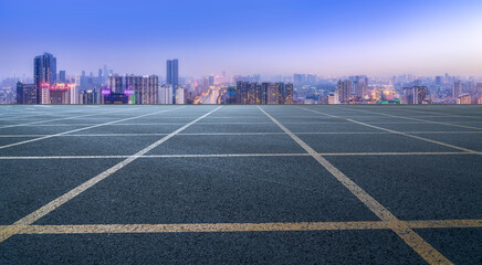 Fototapeta premium Panoramic skyline and empty asphalt road with modern buildings