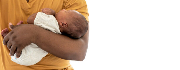 Blurred soft images of African black skin, 12-day-old baby newborn son, sleeping with his father being held, On white isolated background, to family and African black skin newborn concept.