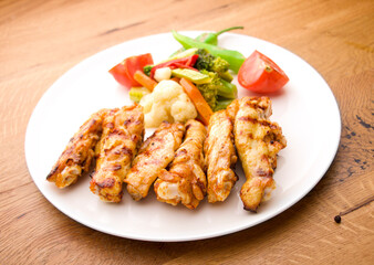 crispy kentucky fried chicken on a wooden table