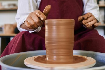making ceramic pottery on a potter's wheel close-up