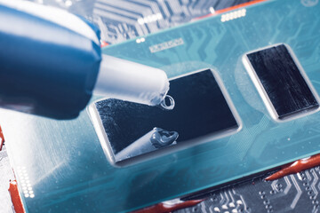 Applying thermal paste to a laptop processor, cooling computer components