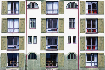 Fototapeta na wymiar Windows with shutters at a hotel