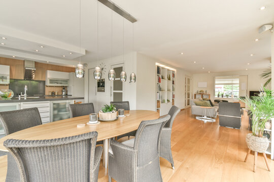 Dining room interior with furniture in contemporary house