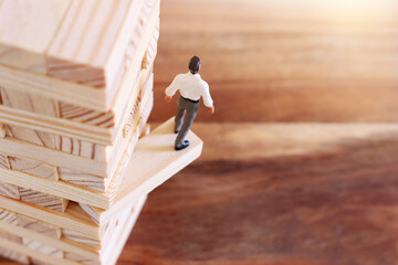 Obraz premium Concept image of wooden block stack, risk and management idea