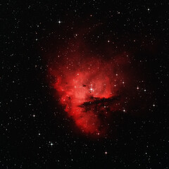 Pacman Nebula in dark space with spike stars