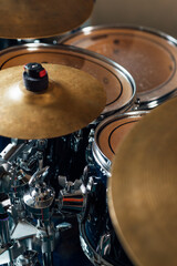 Fragment of a drum kit close up. Splash cymbal, high and mid tom.