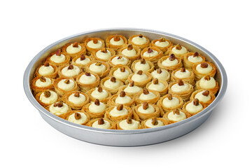 Assortment of Turkish baklava dessert in metal tray isolated on white