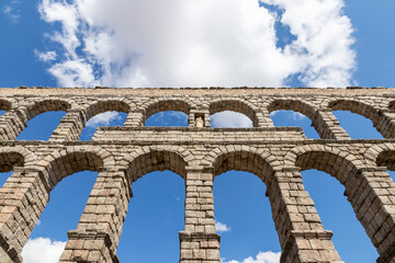Segovia, Spain. Sculpture of the Virgin Mary in the Acueducto de Segovia, a Roman aqueduct or water...