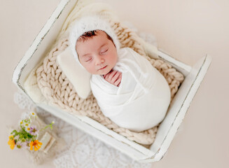 Newborn girl studio portrait