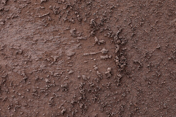 Textured ground surface as background, top view