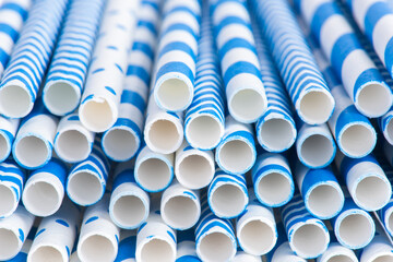 Pile of eco drinking paper straws closeup