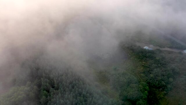 Fog rolling in over peat bog at the irish coast at Portnoo, County Donegal - Ireland