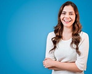Fototapeta premium Young Latin woman wearing casual clothes happy face smiling with crossed arms looking at the camera.