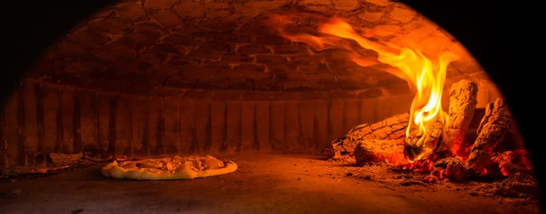 Gordijnen Pizza is cooked in the oven. © Аrtranq