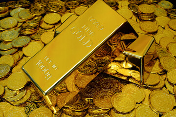 Gold bullion on pile golden coins a lot of