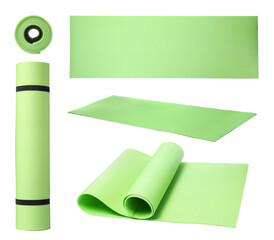 Set with green camping mats on white background