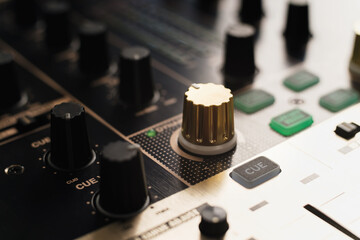 Dj sound mixer. Volume regulator on audio mixer device for disc jockey.