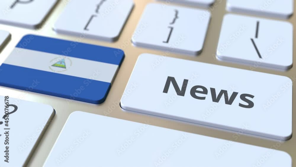 Aufkleber news text and flag of nicaragua on the keys of a computer keyboard. national online media related co